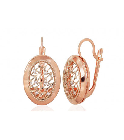 Gold earrings with...